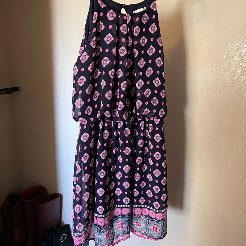 Cinched waist, tank dress. It was purchased at TJ Maxx a few years ago. Size S.
